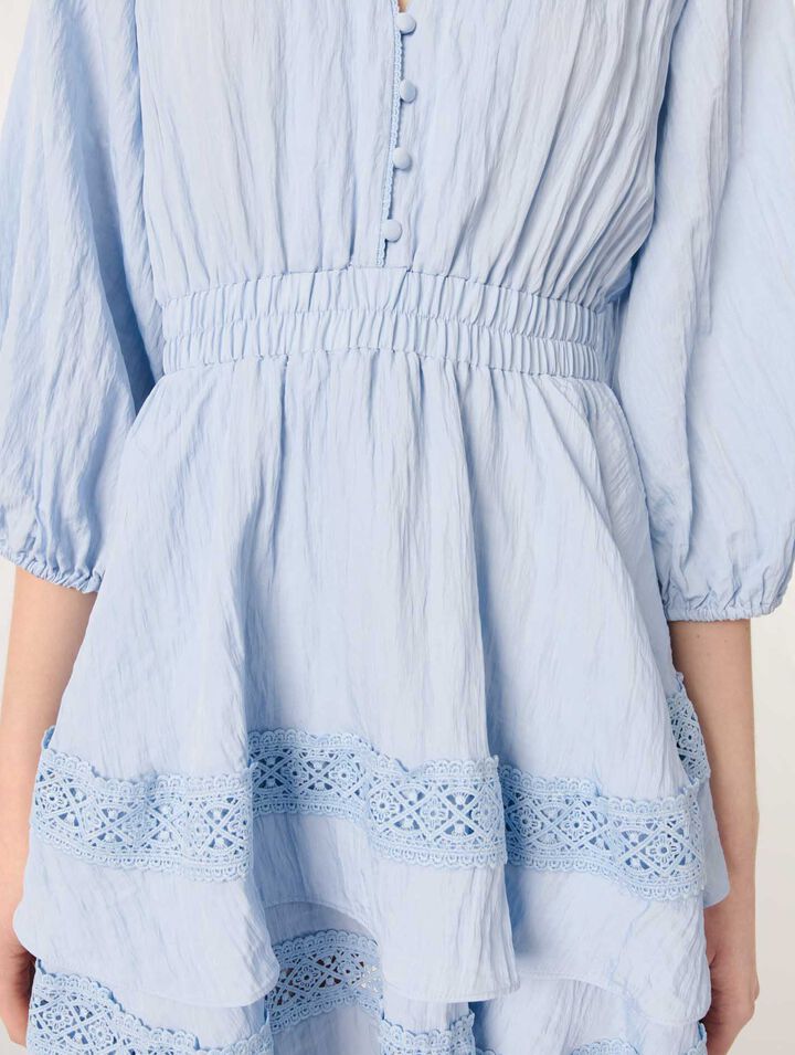Dress with ruffles and lace details