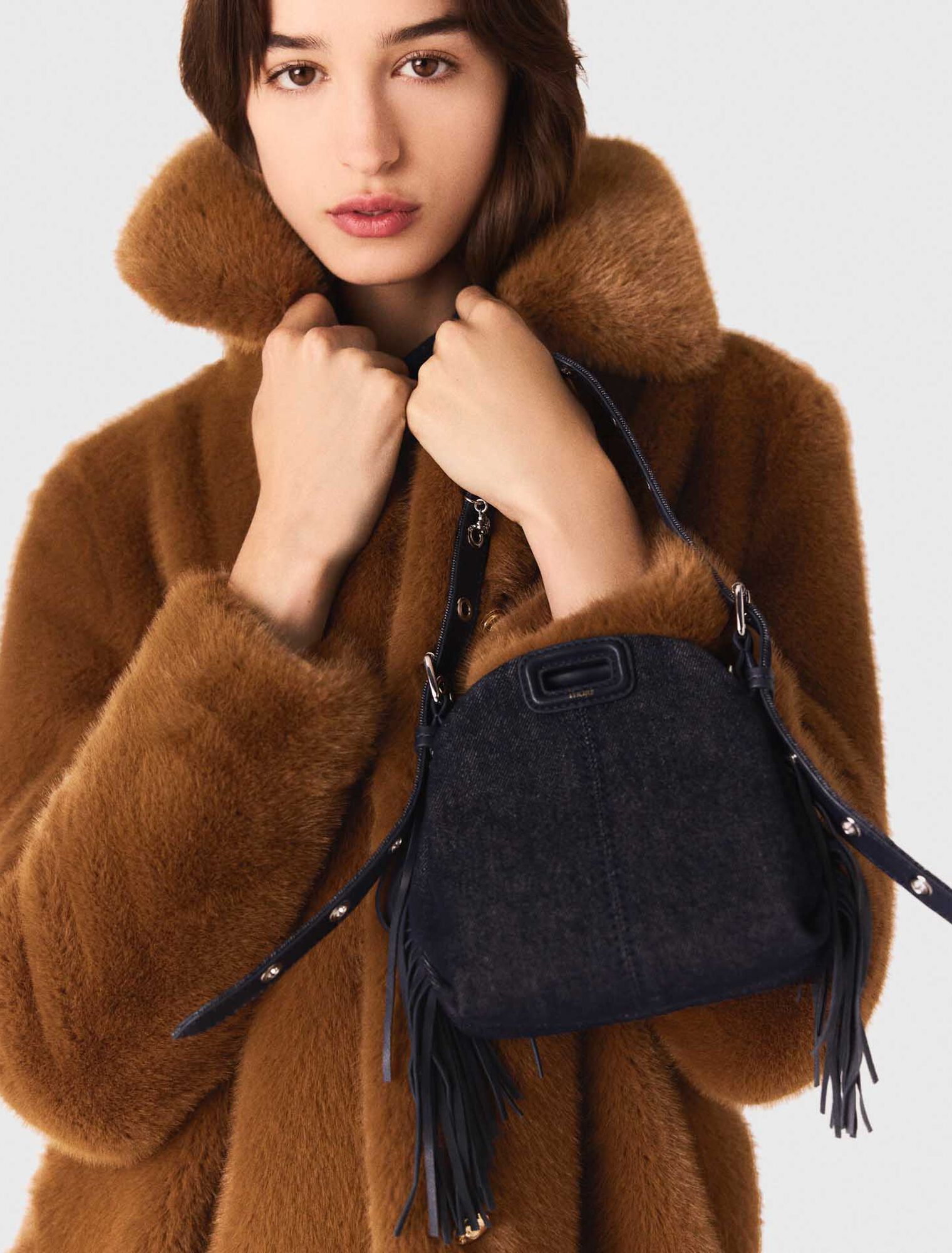 Mid-length faux fur coat
