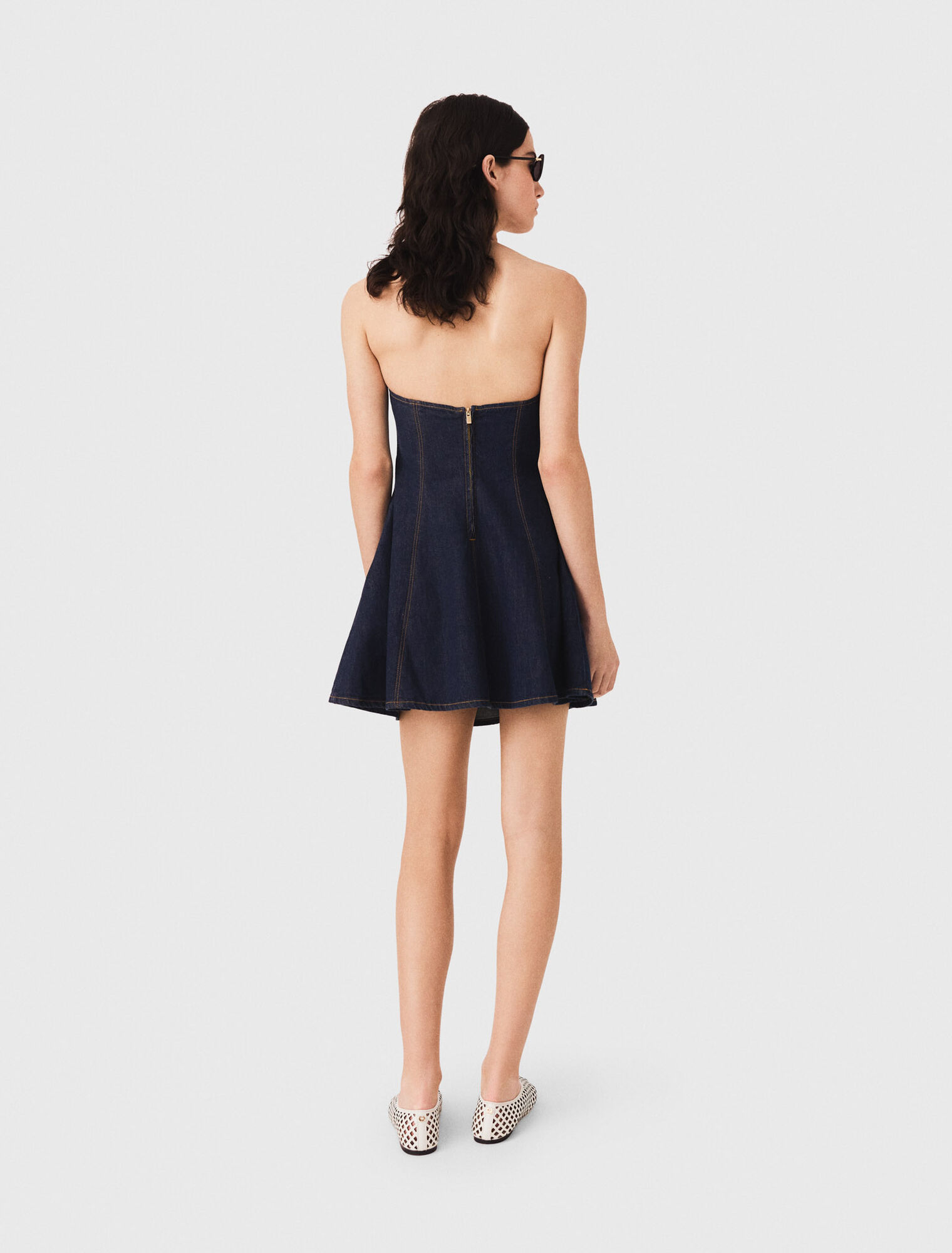 Short denim dress with brooch
