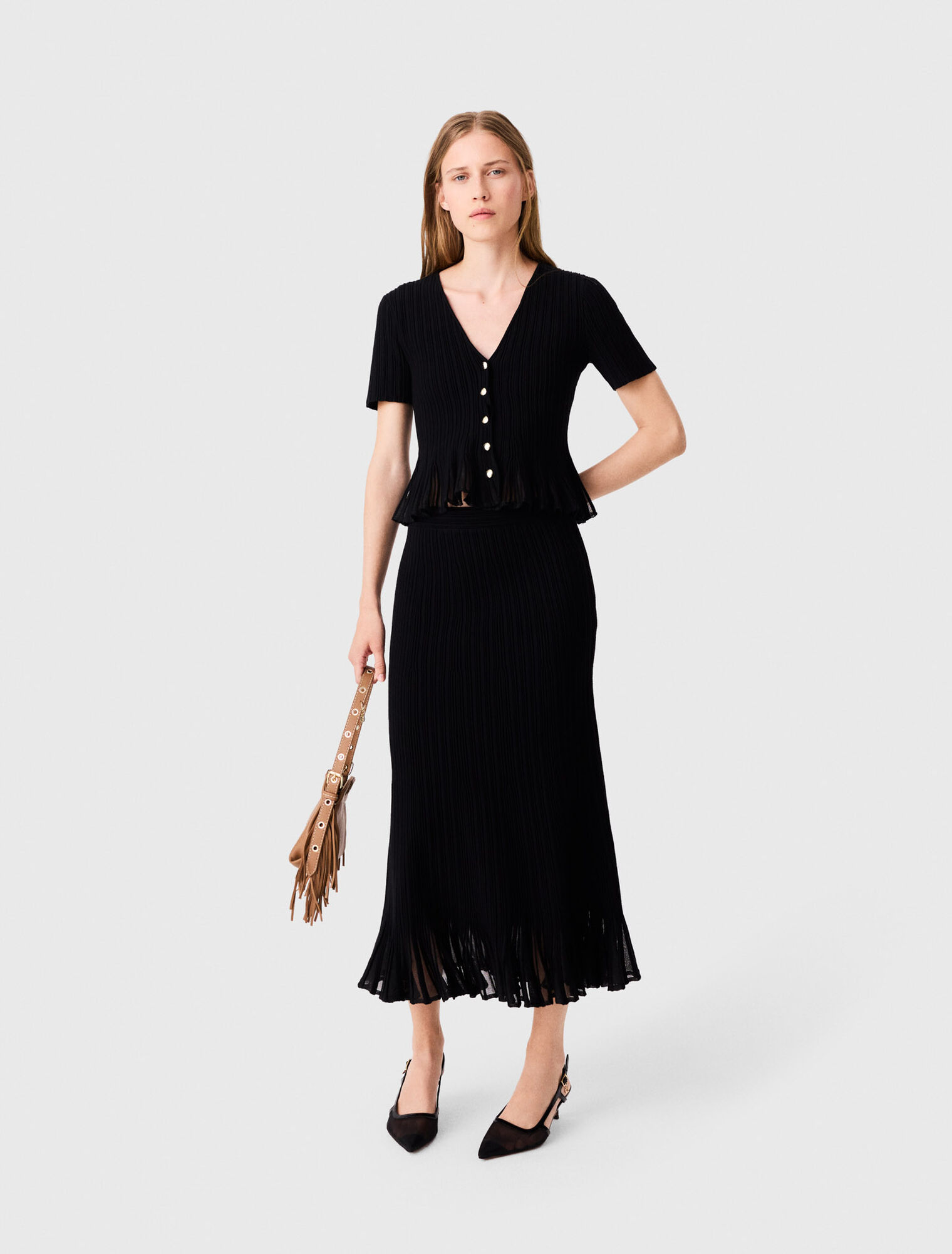 Knit skirt with peplum hem