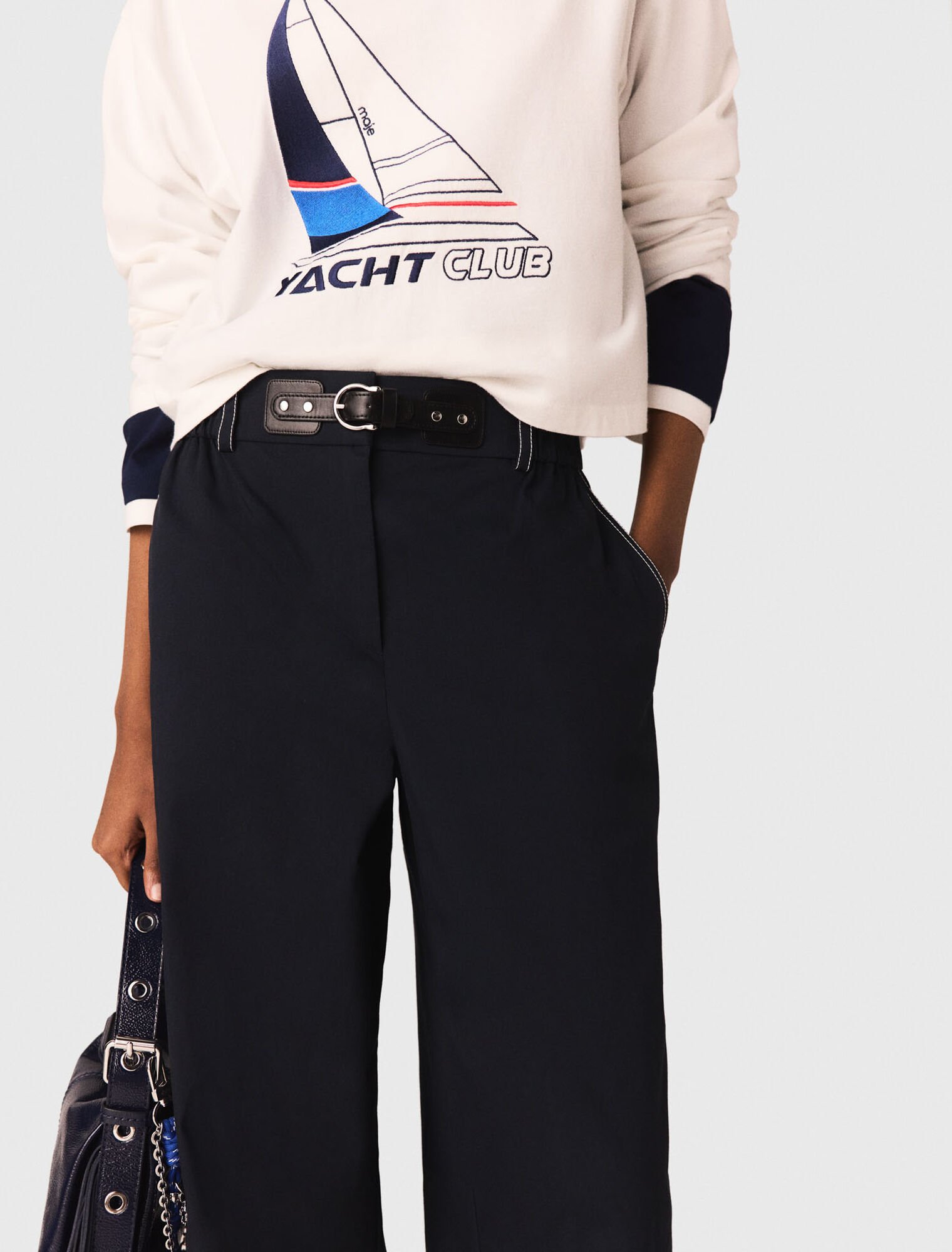 Cotton trousers with leather belt