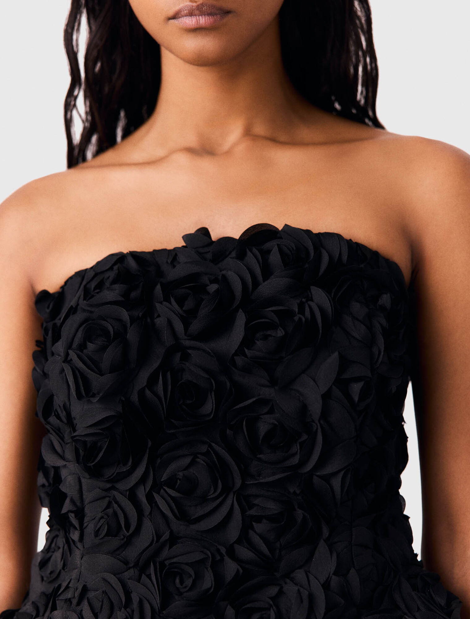 Flower-embellished top
