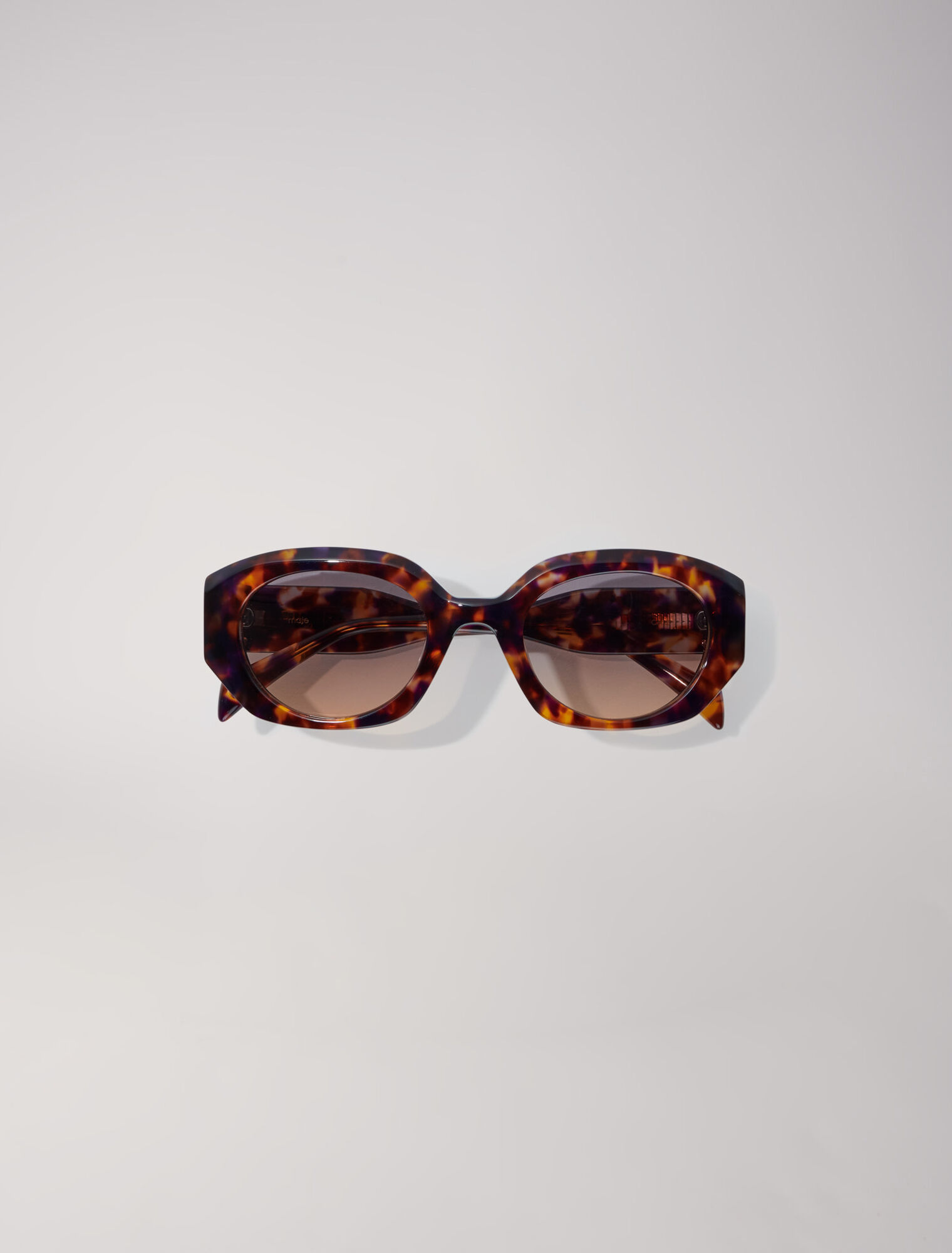 Round acetate glasses