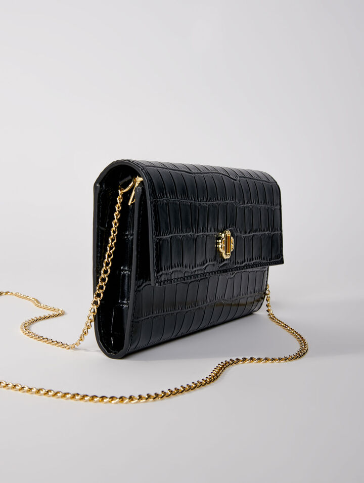Croc-effect embossed leather clutch