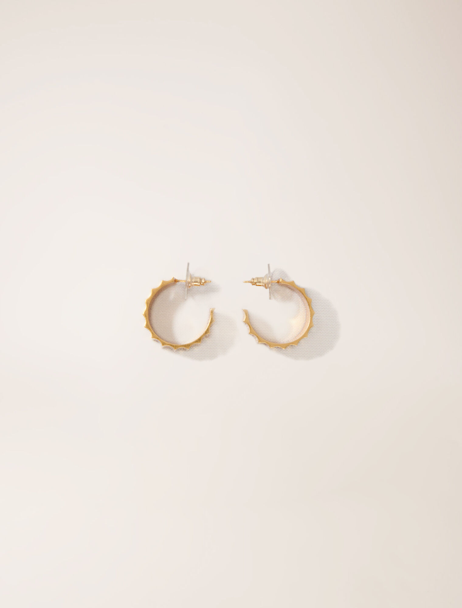 Tapered gold mini hoop earrings
