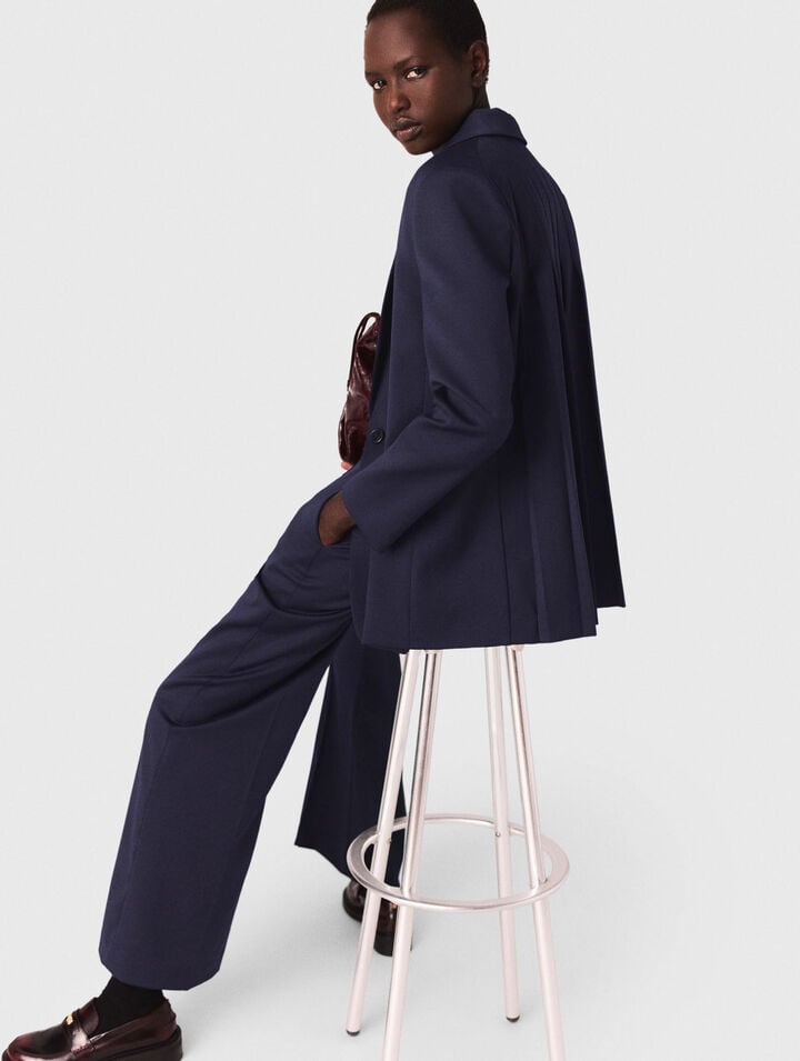 Suit jacket with pleated back