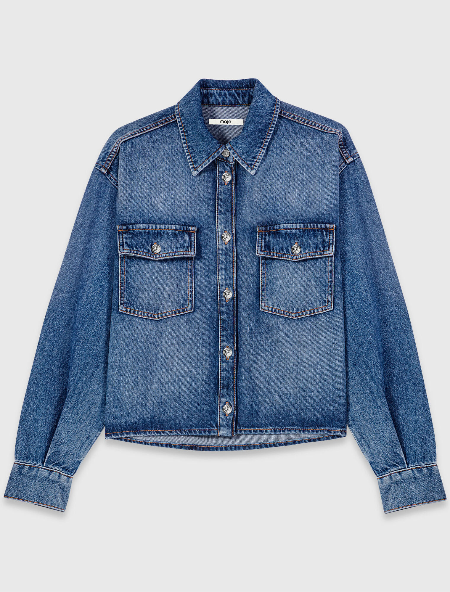 Denim shirt with brooches