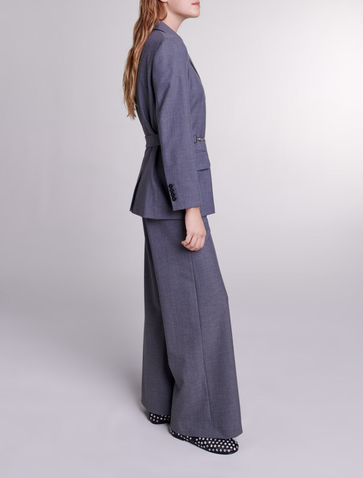 Suit jacket with chain belt