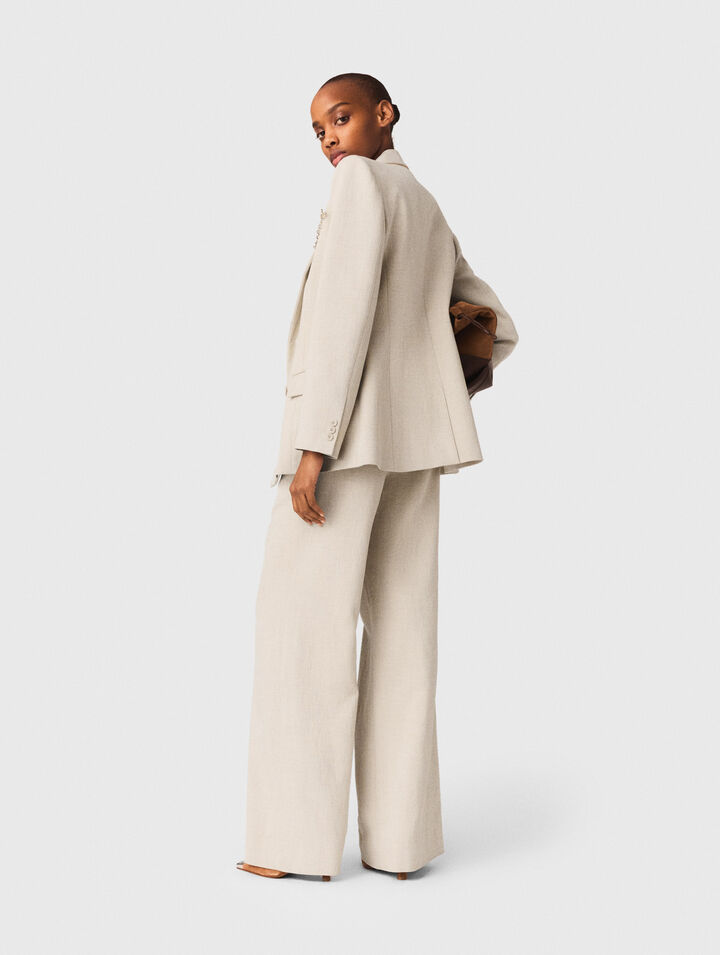 Suit jacket with brooch