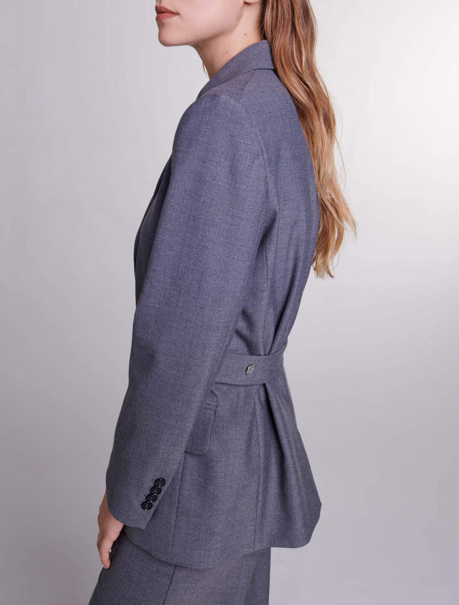 Suit jacket with chain belt