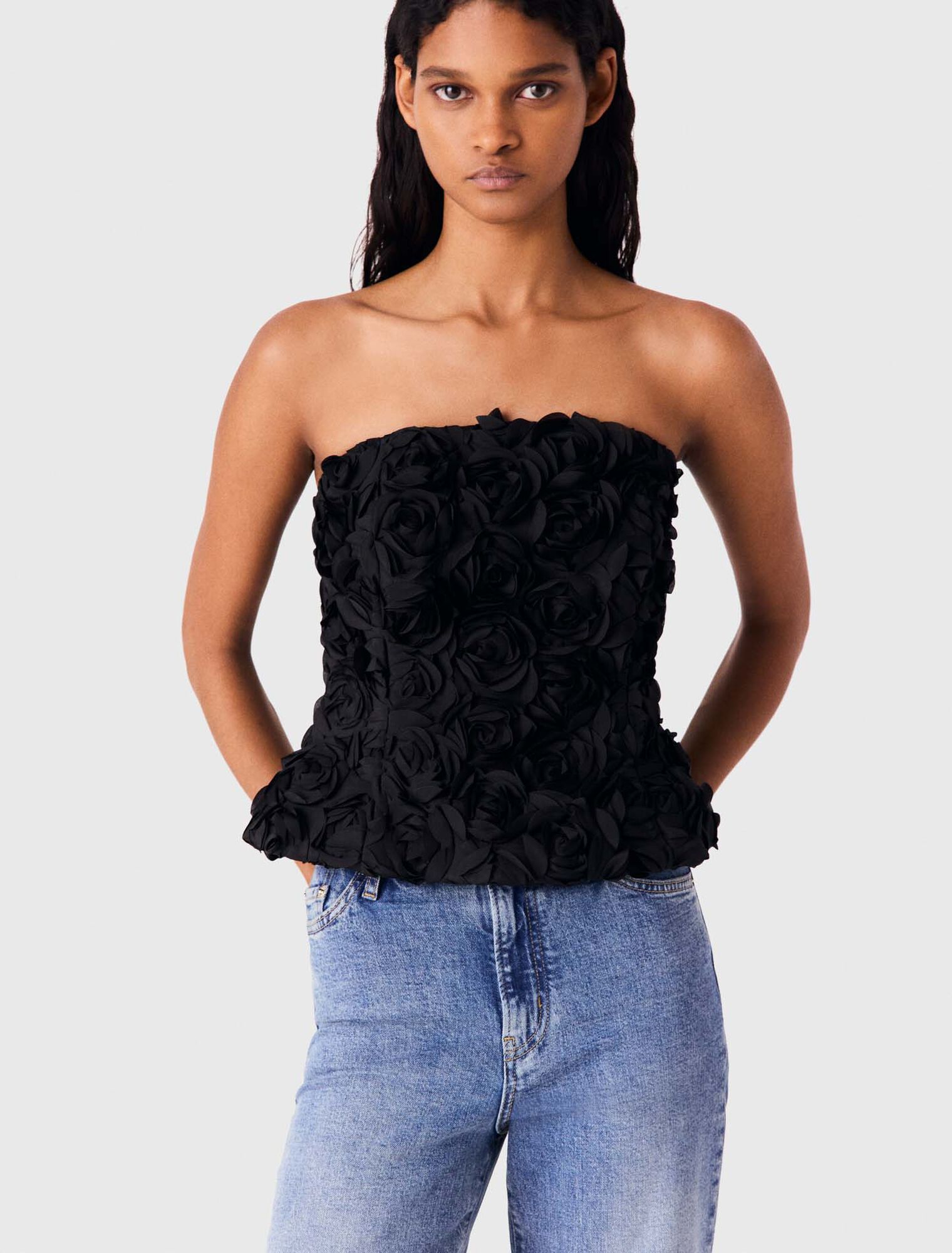Flower-embellished top