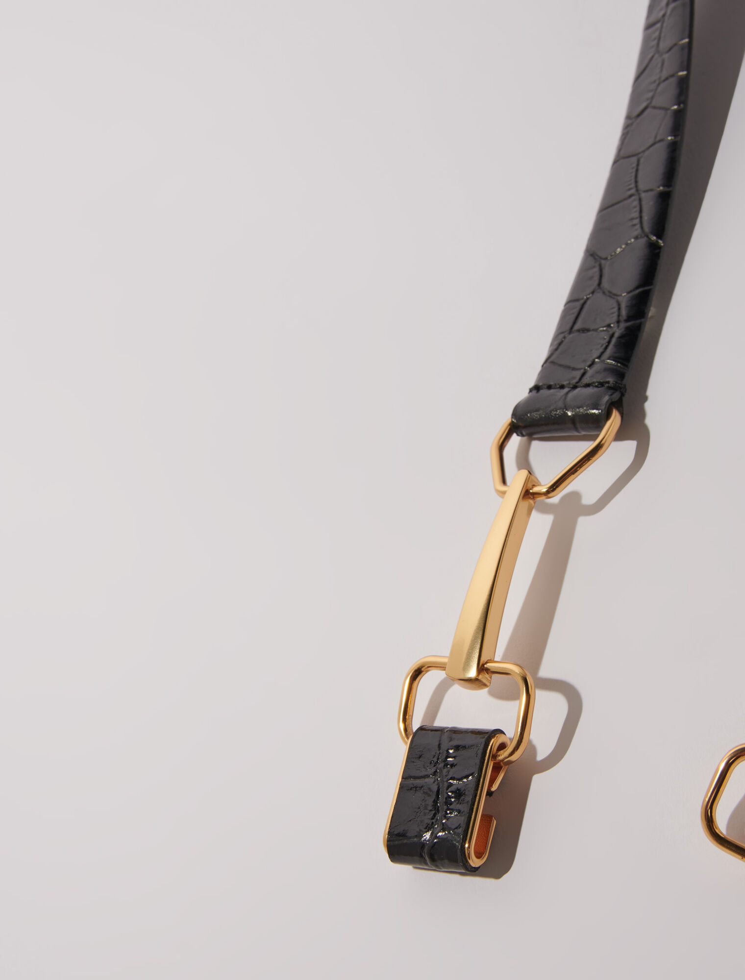 Leather belt with horse bit buckle