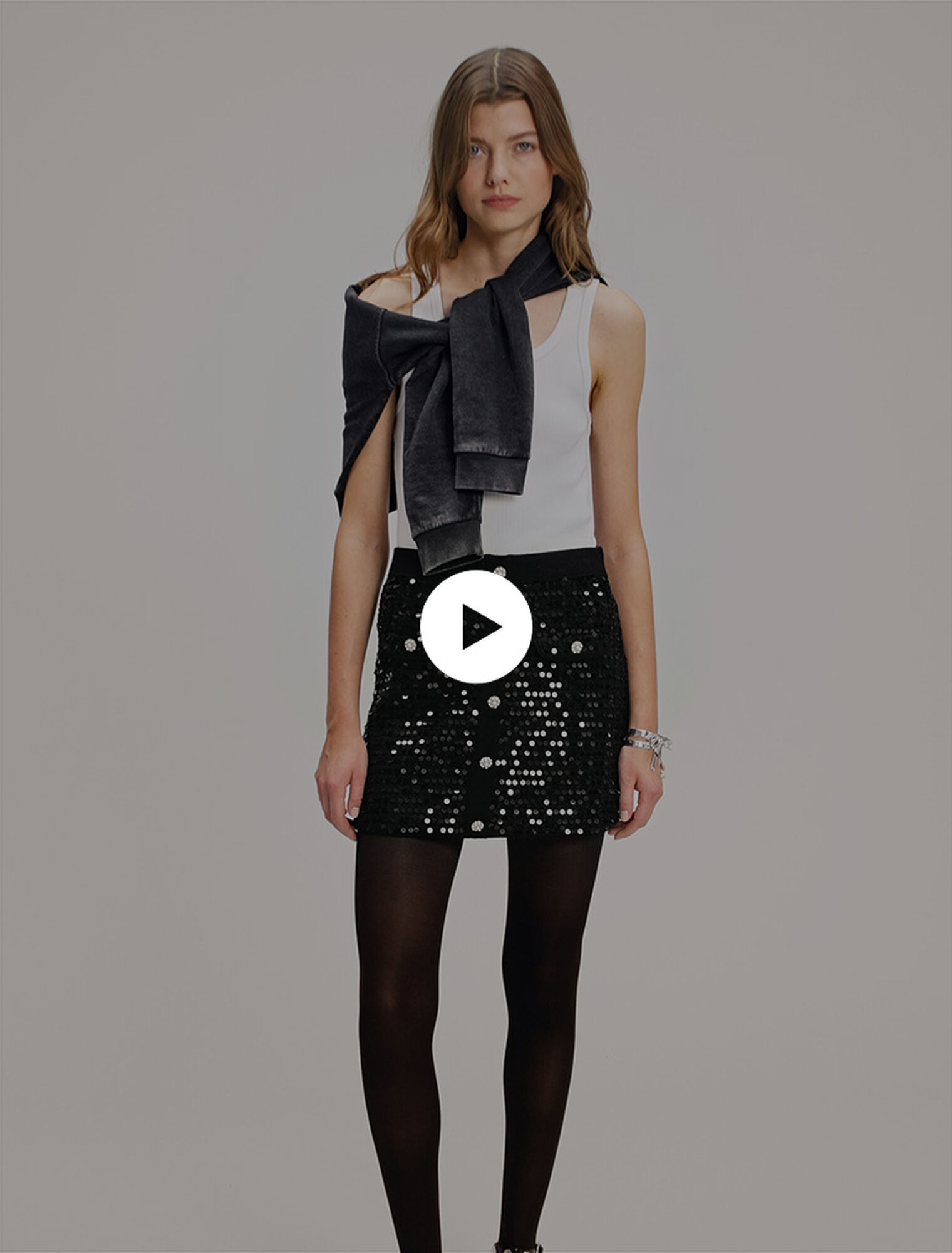 Short sequinned knit skirt