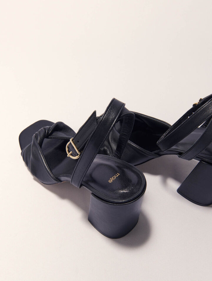 Plain leather sandals with heels