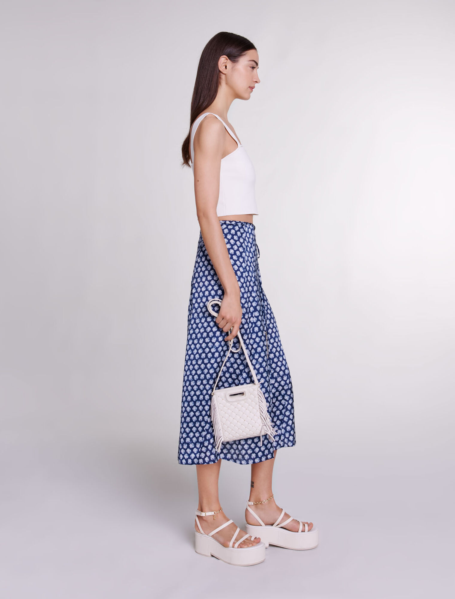 Studded M quilted leather mini bag