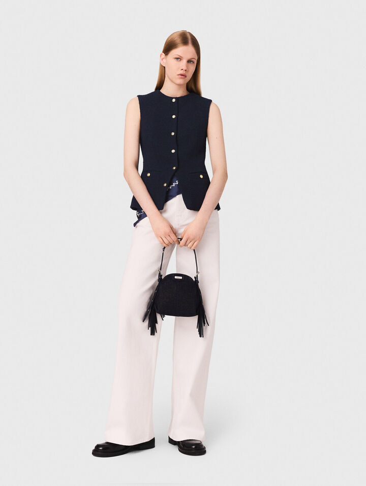 Long sleeveless tweed jacket