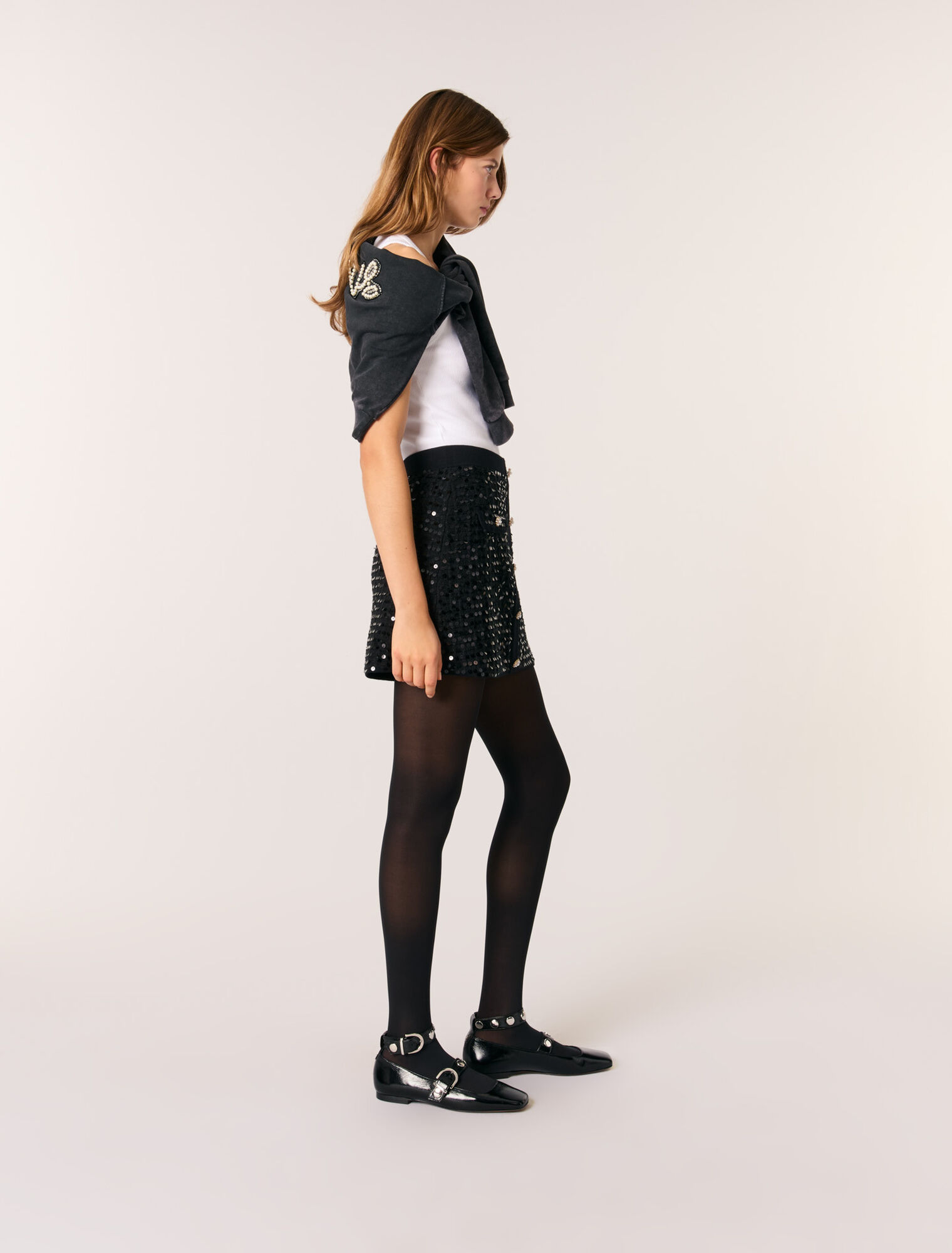 Short sequinned knit skirt