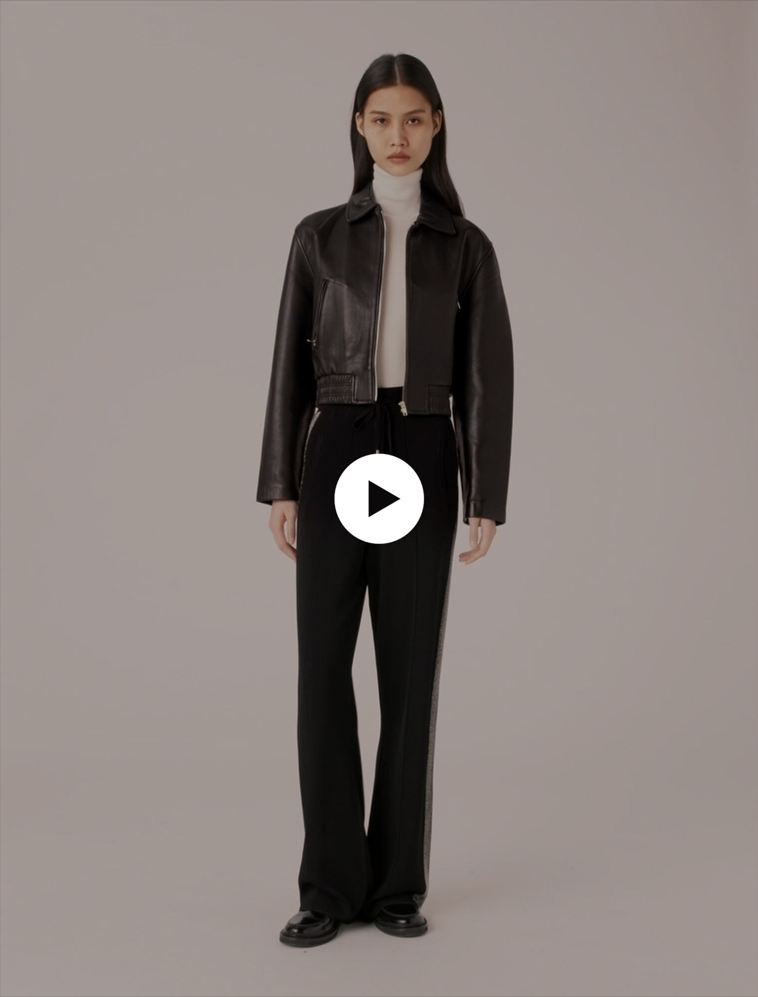 Trousers with rhinestone band