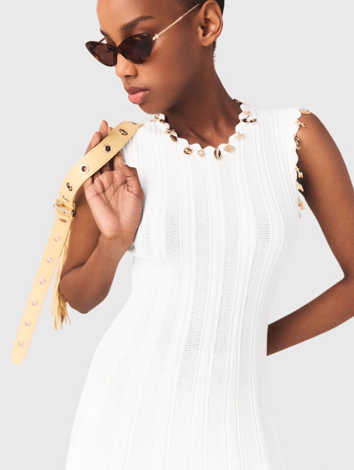 Knit dress with gold jewellery