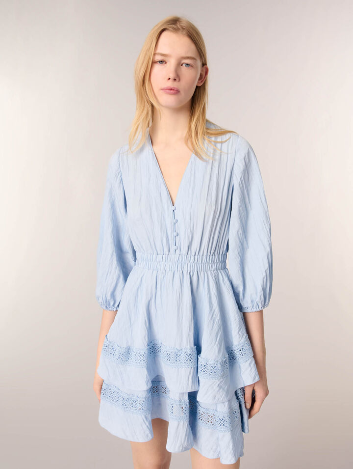 Dress with ruffles and lace details