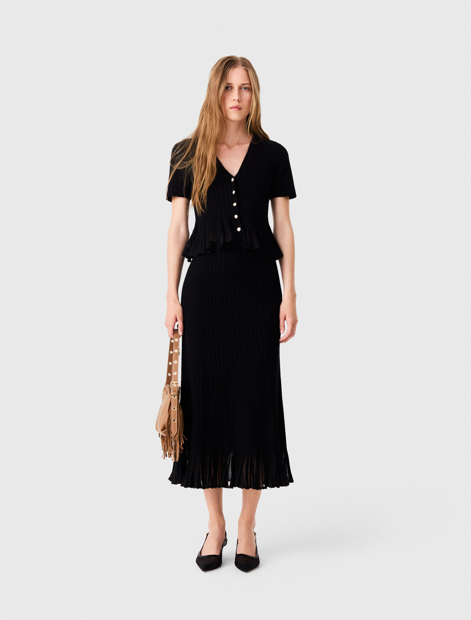 Knit skirt with peplum hem