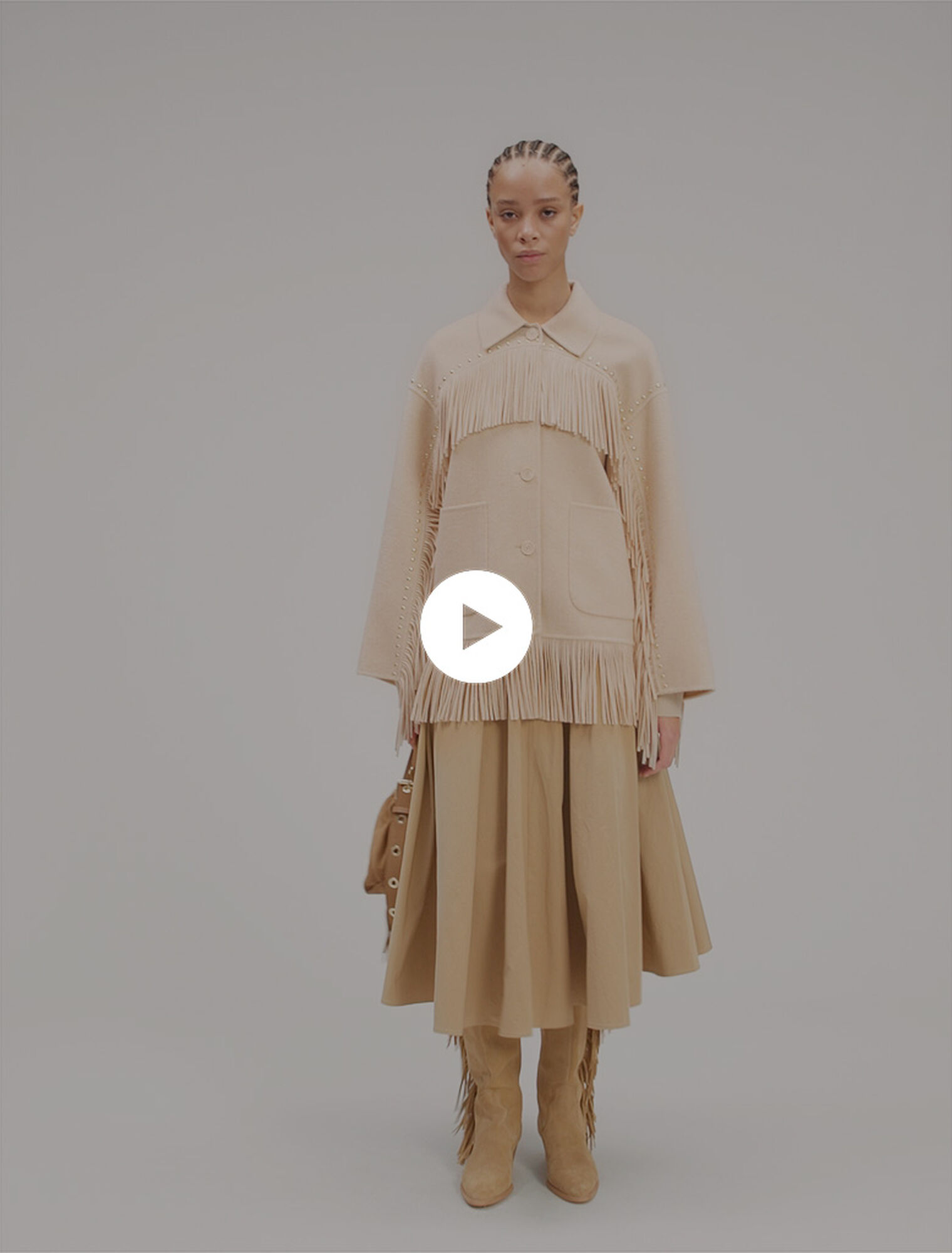 Double-breasted fringed coat
