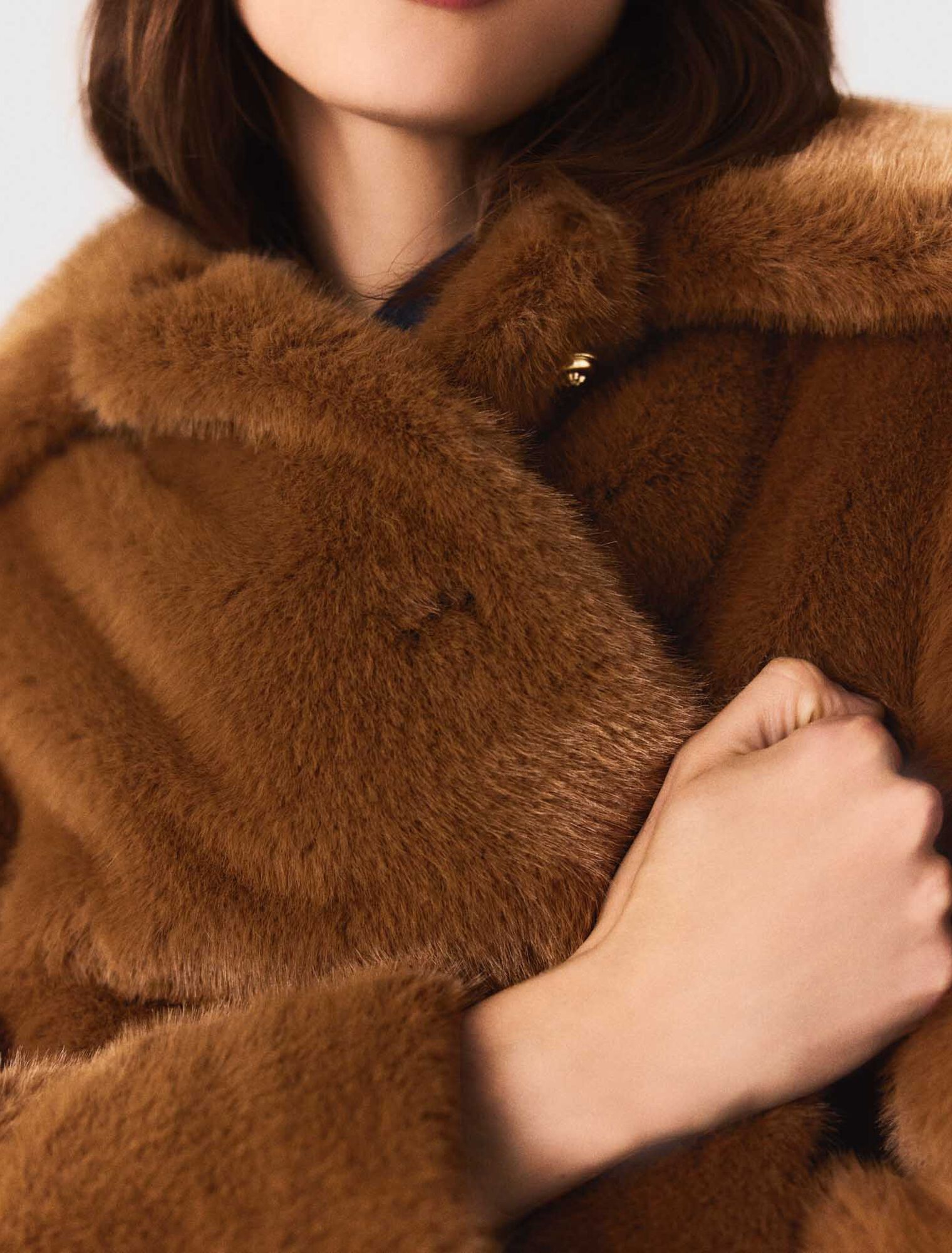 Mid-length faux fur coat