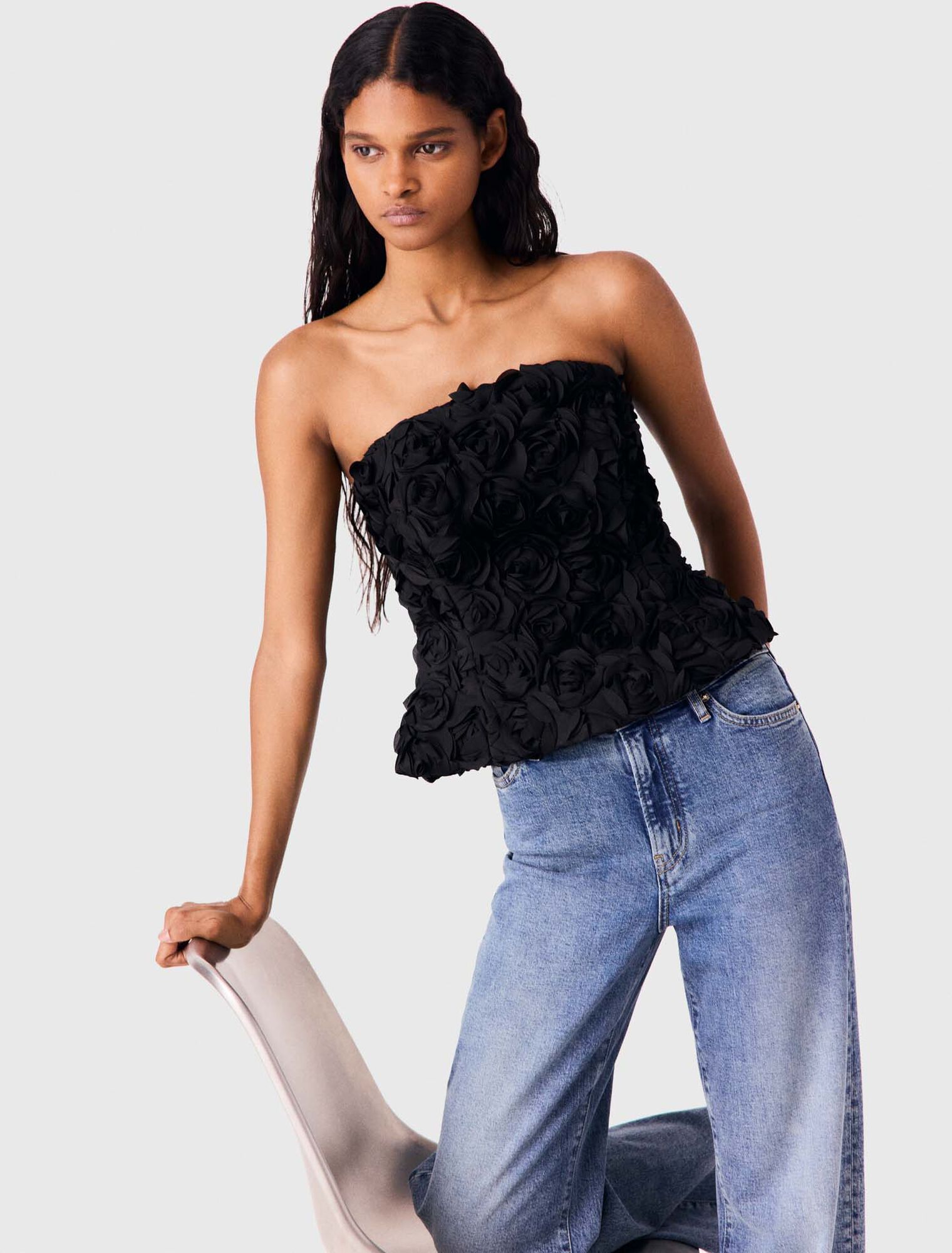 Flower-embellished top