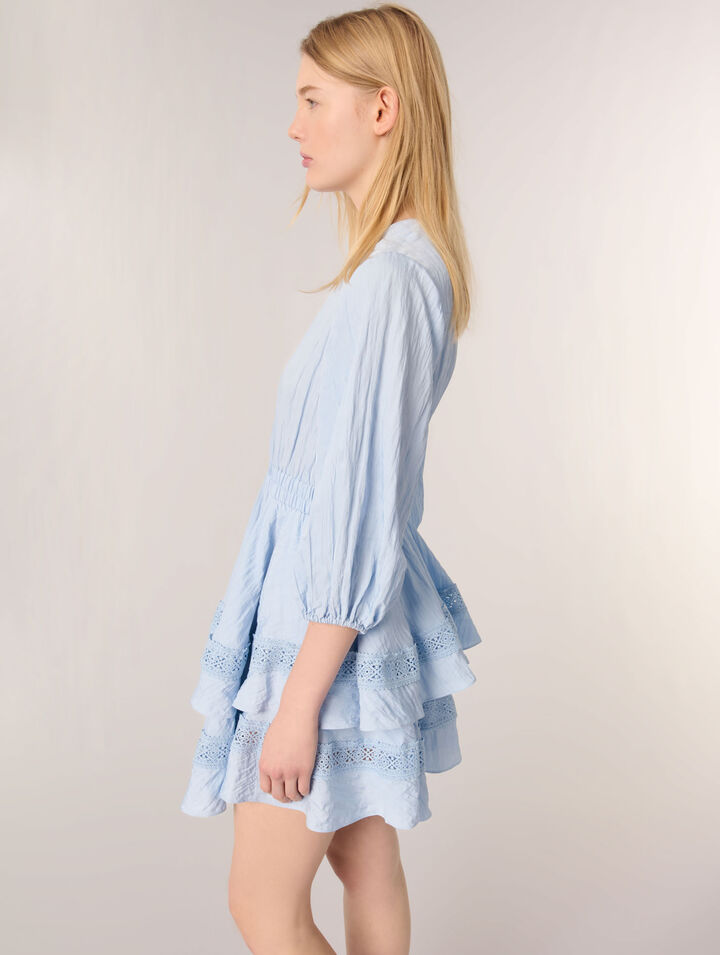 Dress with ruffles and lace details