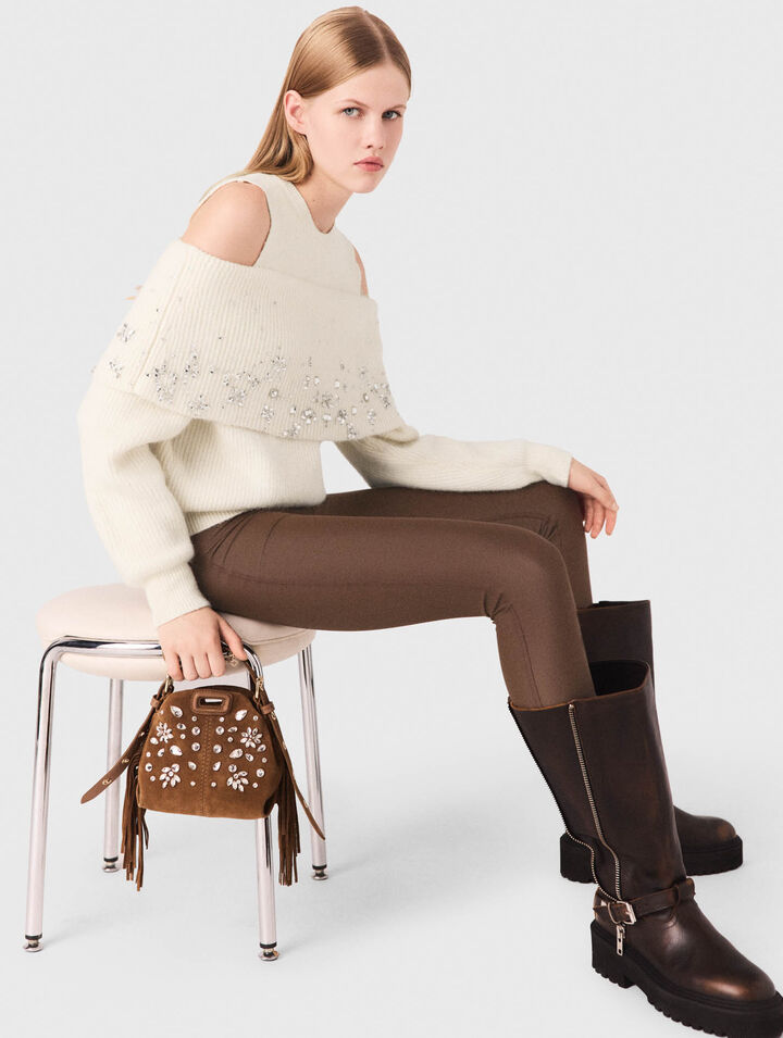 Off-the-shoulder jumper with jewellery