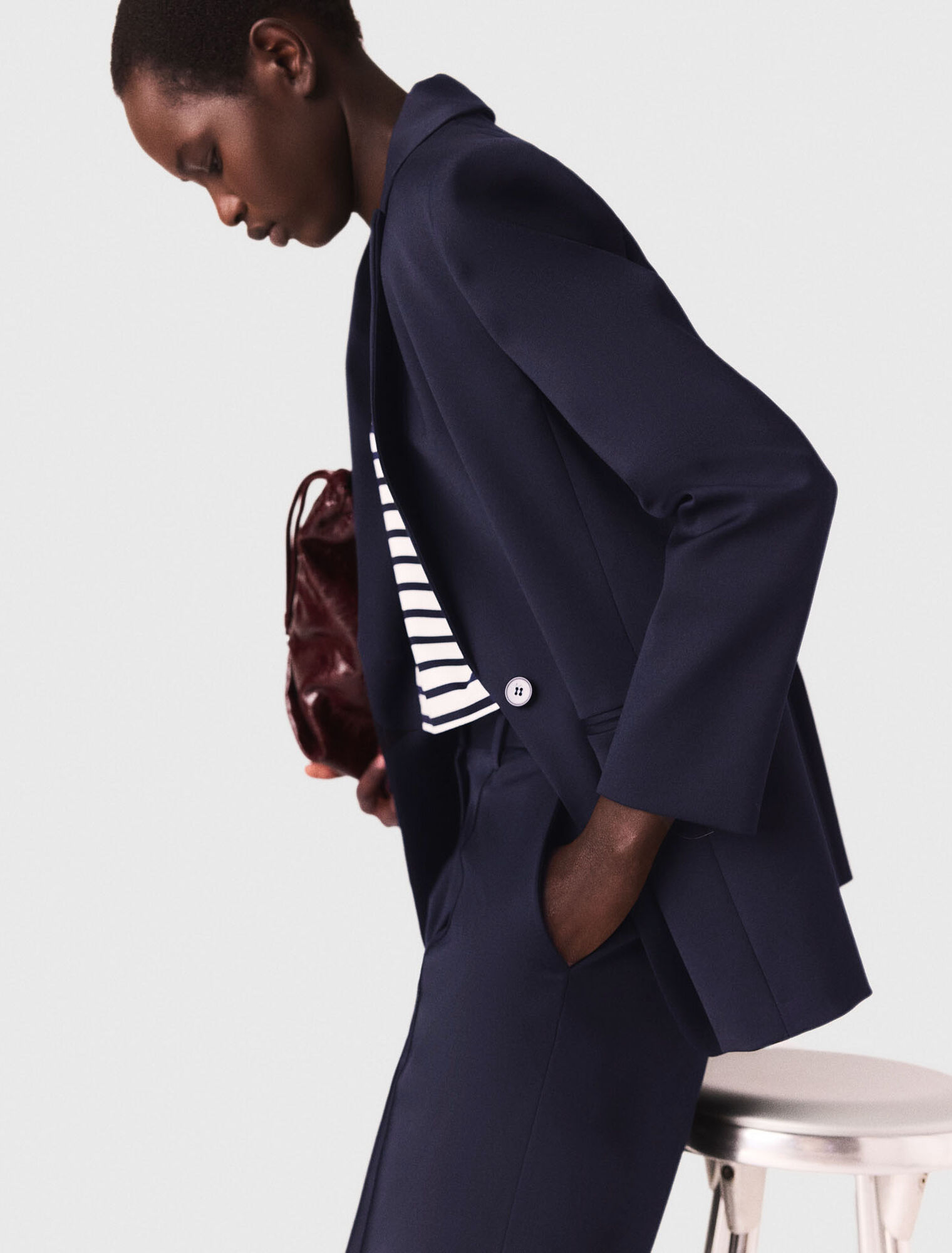 Suit jacket with pleated back