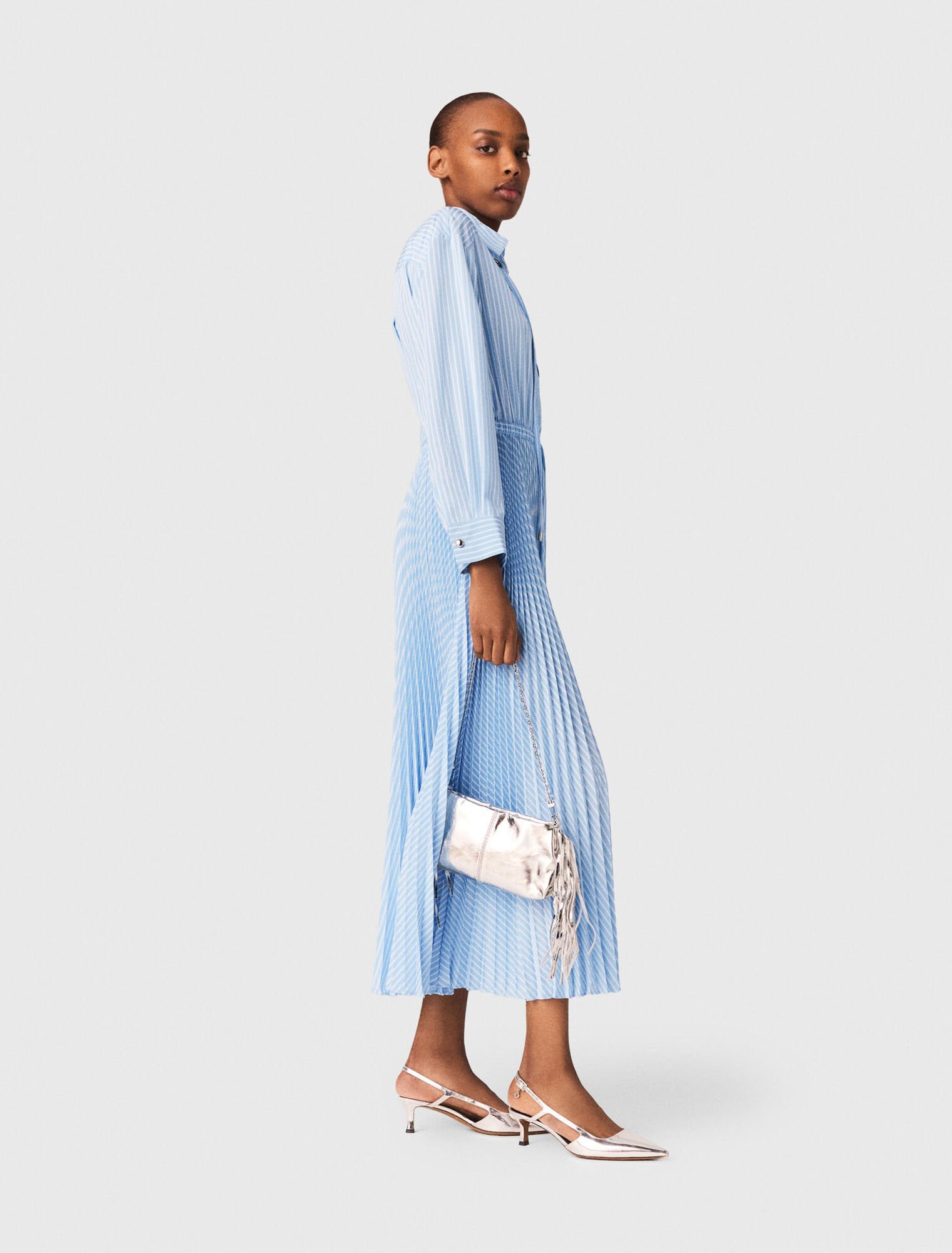 Long pleated dress with eyelets