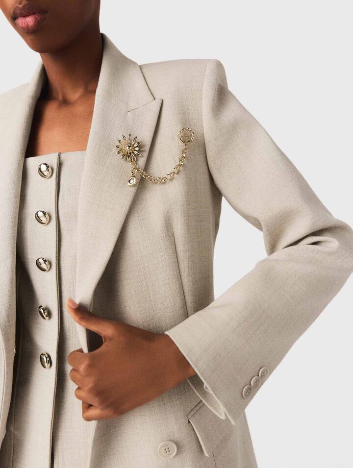 Suit jacket with brooch