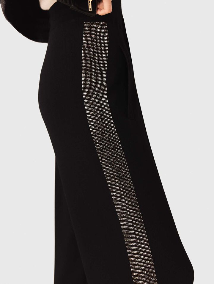Trousers with rhinestone band