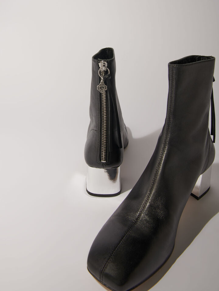 Square-toed leather boots