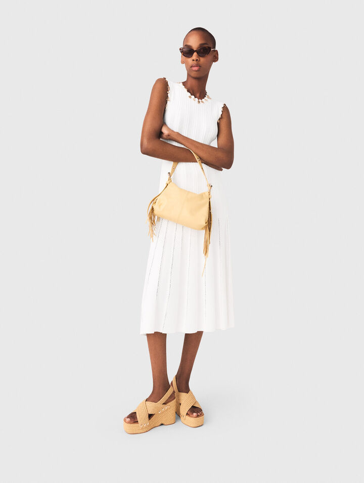 Knit dress with gold jewellery