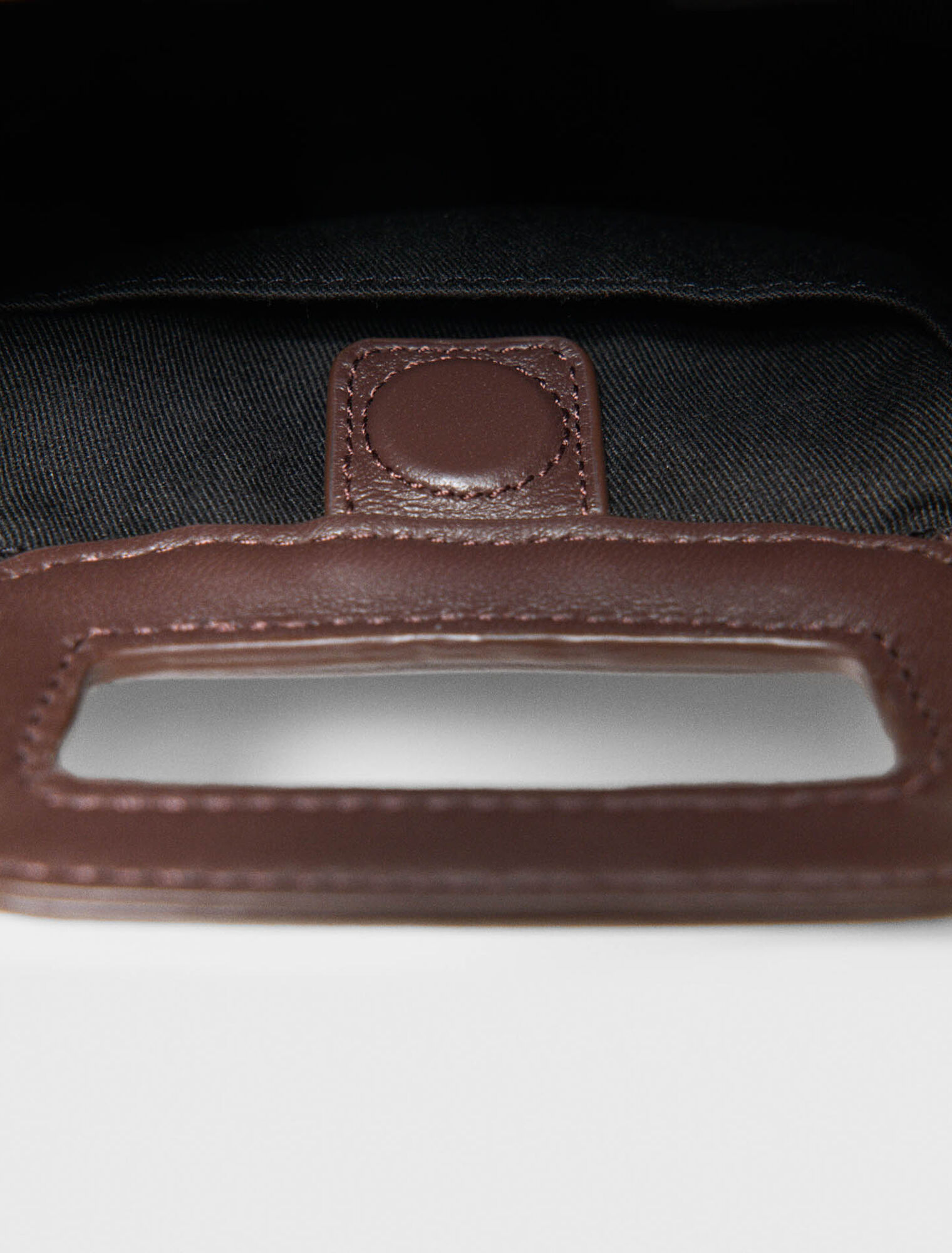 Mipli boucl&eacute; effect clutch bag