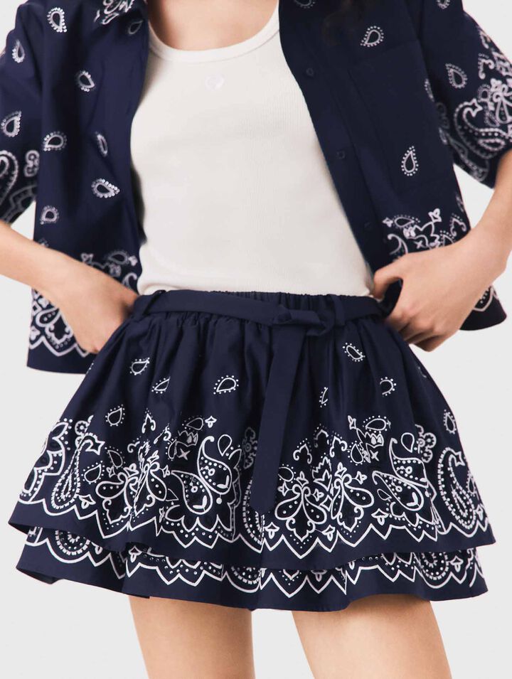Short embroidered ruffled skirt