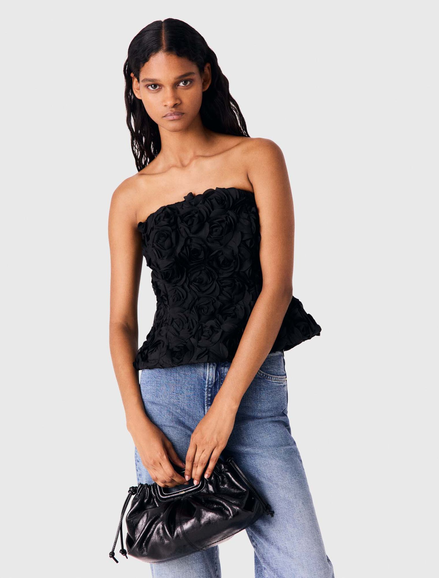 Flower-embellished top