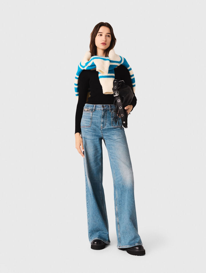 Flared jeans with chain