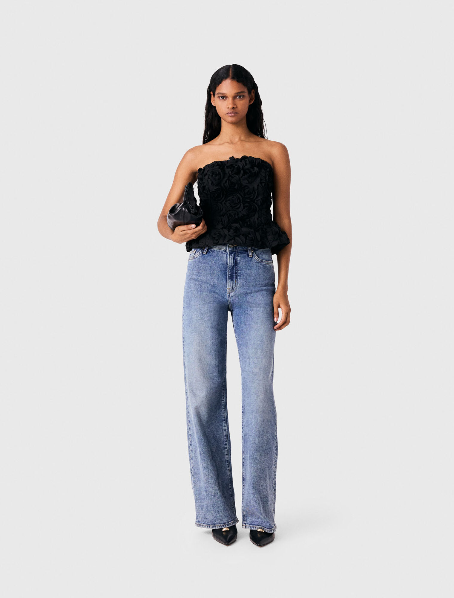 Flower-embellished top
